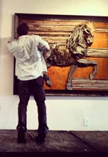 Mark-Guilloud-with-one-of-his-sculptural-reliefs